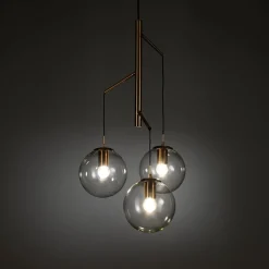 Alycia e lampadario in acciaio oro opaco e 3 sfere in vetro trasparente 115x10xh95-132 cm